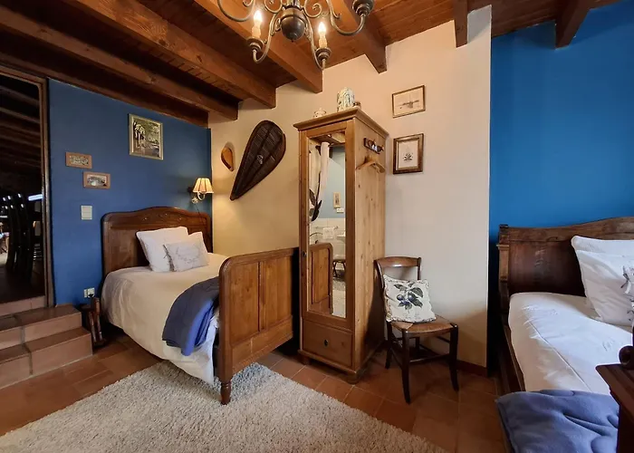 Les Gravets Гостевой дом Sigalens